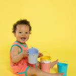 Lucy & Sam Coral and turqoise baby and kids organic vest and shorts